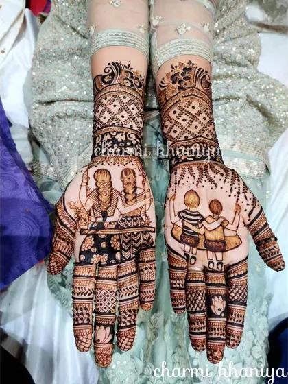 A heartwarming design celebrating sisterhood. This custom mehendi features portraits of sisters on a swing, capturing a precious childhood memory. It’s a beautiful tribute for a bride who holds her sister dear.