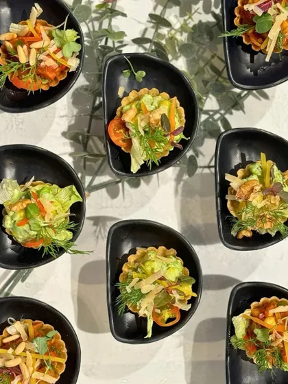 An overhead view of our assorted canapés. Each one is a unique combination of flavours and textures, showcasing the variety and creativity of our appetizer menu.