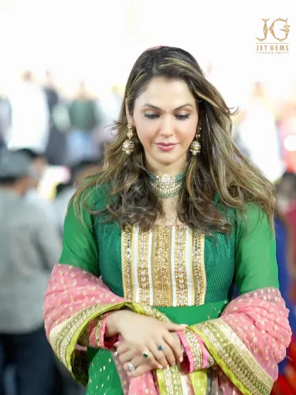 A symbol of grace. Isha Koppikar looks truly elegant in our green Polki choker and matching earrings, a perfect choice for festive occasions.
