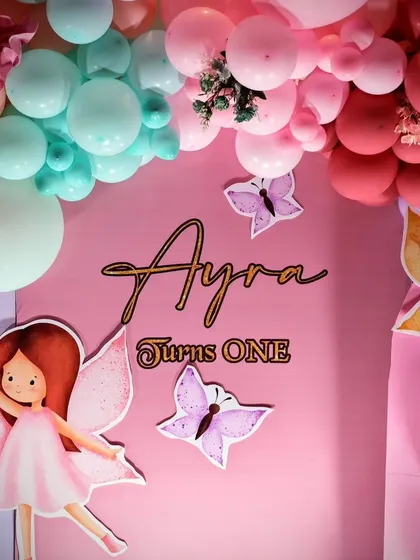 A close-up of the backdrop for the colorful fairy theme.