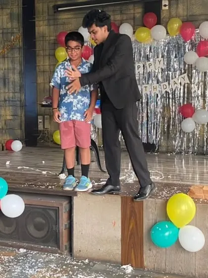 This young man was a great sport, helping me with a trick on a small stage at his party. I love when the kids are eager to participate and be part of the magic.