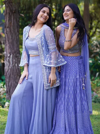 Another joyful moment from the same outdoor shoot, with the models laughing together. This kind of image helps customers envision themselves wearing the clothes for happy occasions.