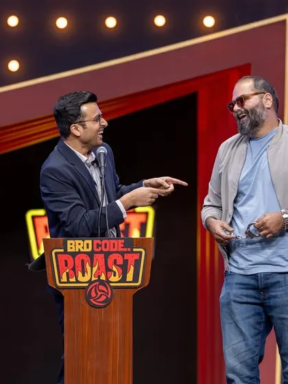 Capturing a candid, funny interaction between two comedians on stage. These are the unscripted moments that truly show the spirit of a live event.