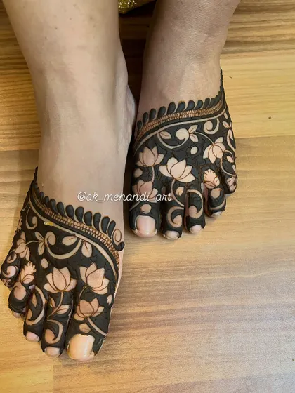 A unique and modern foot design featuring a bold floral pattern with negative space. This is perfect for someone who wants something different from the traditional look.