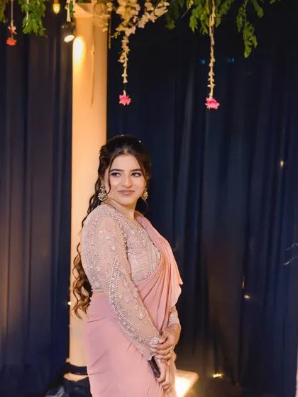Another angle of Upasana's stunning party look. The long, voluminous curls are the star of the show, adding a touch of drama and glamour.