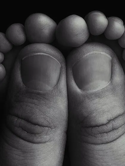 Ten tiny toes. I love capturing the little details that you'll want to remember forever. This macro shot of a newborn's feet is a beautiful and artistic keepsake.