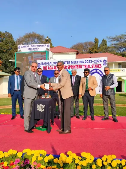 The Aga Aly Asker Sprinters' Trial Stakes trophy is presented to the winning connections.