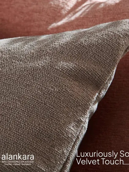 A detail shot of a cushion made from our Barley chenille fabric. You can almost feel the luxuriously soft velvet texture through the screen.
