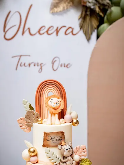A close-up of the incredible animal-themed cake from a first birthday party. I always make sure to capture the beautiful details you've planned.