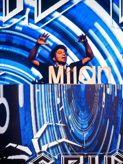 Lost in the music with my hands up, surrounded by incredible visuals. Sometimes the energy of the room just takes over.