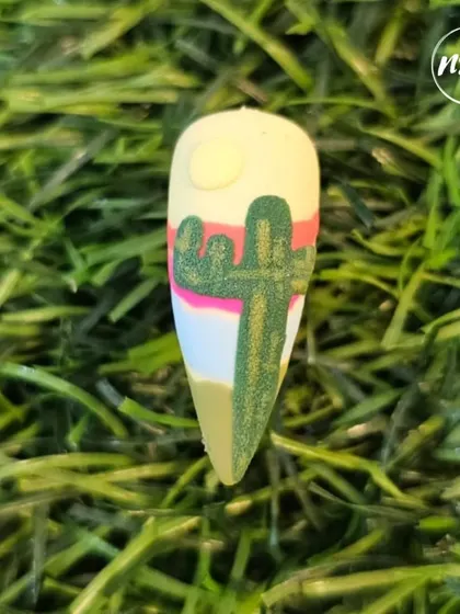 A fun, summery design featuring a 3D cactus. This is a great example of how we can create themed nails for any season or vacation.