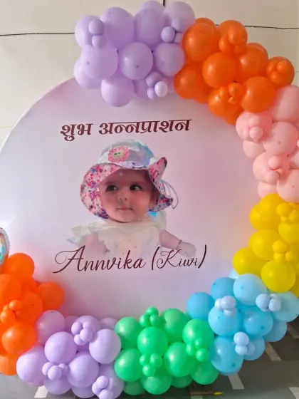 A slightly different angle of the personalized Annaprashan decoration.