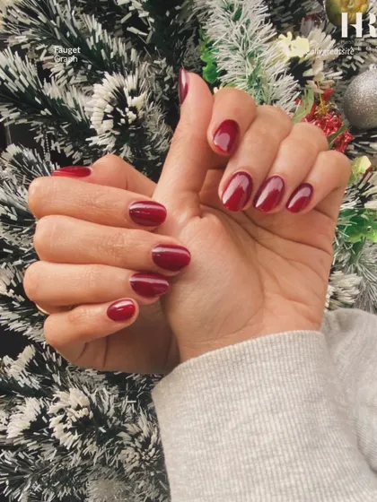 You can never go wrong with a classic red for the holidays. This beautiful, glossy red manicure is the perfect accessory for any festive celebration.