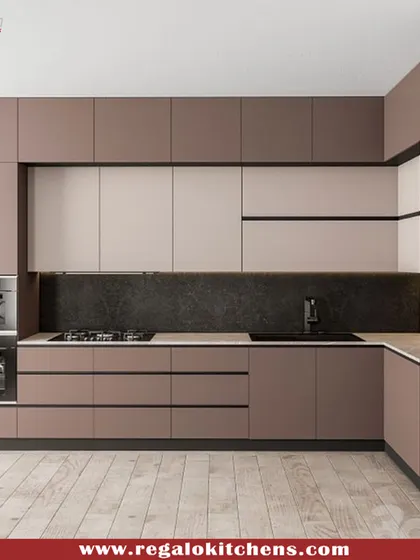 A two-tone kitchen design with brown and beige cabinets. We integrated double wall ovens and a hob into the layout for a professional-grade cooking setup. The dark backsplash provides a striking contrast.