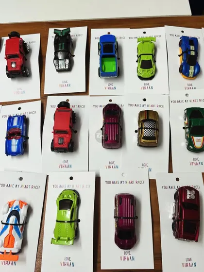 As party favors, each little guest got their own Hot Wheels car attached to a custom card that reads, "You make my heart race!"