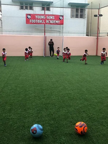 Our little champions are ready for action at the Young Guns Football Academy. This image captures the excitement and team spirit at our dedicated training facility.