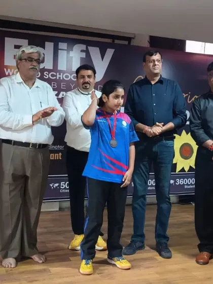 Akanksha Singhal receiving her bronze medal for the U-14 Girls Individual event at the CBSE Cluster tournament. Her consistent performance across tournaments is commendable.