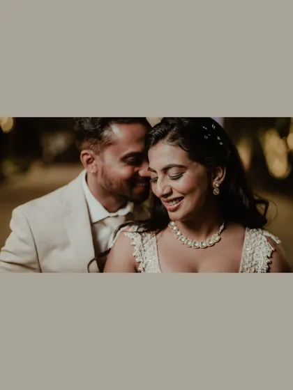 A close-up shot from an engagement, capturing the couple in a sweet, intimate moment. The soft lighting and genuine smiles make this a beautiful memory.
