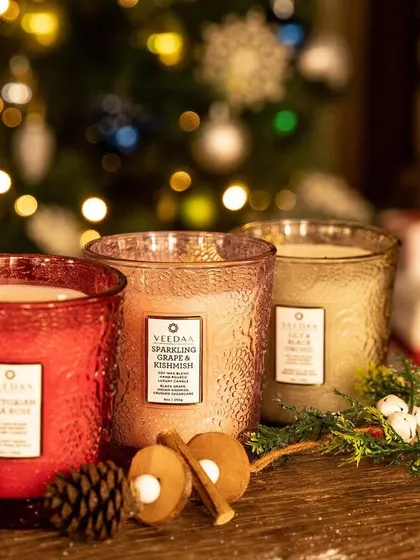 Create the warmth you deserve this holiday season. Our Valeno glass candles in Victorian Tea Rose, Sparkling Grape & Kishmish, and Persian Oud are perfect for adding a festive glow to your home.