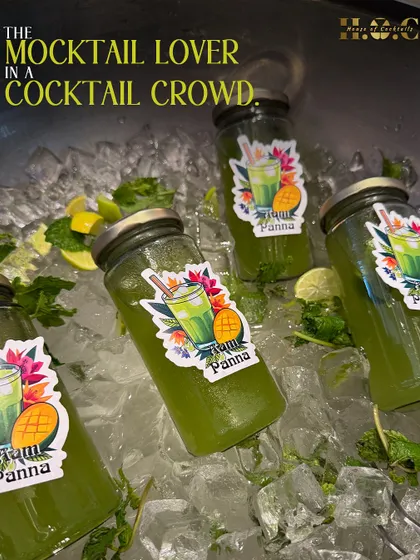 I make sure no one feels left out. For guests who don't drink alcohol, I create delicious and refreshing mocktails, like this Aam Panna, served in cool, custom-labeled jars.