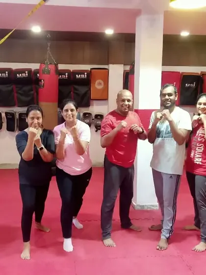 The "Khelo 39" squad in their fighting stance. We are proud to offer this community fitness program and see our members thrive.