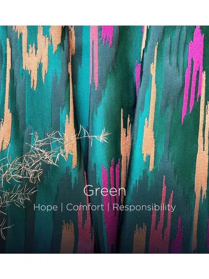 Rich, vibrant, and featuring jewel tones, the 'Grand Bazaar' fabric is an absolute showstopper. The ikat-style pattern in shades of green, pink, and gold is perfect for dramatic drapery or upholstery.
