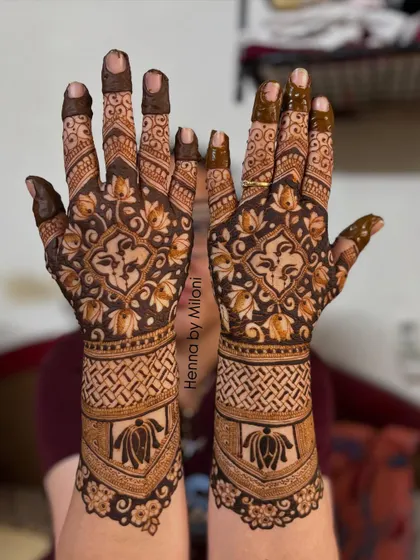 A full-coverage design with a central lotus motif. The dark, bold patterns create a rich and traditional look.