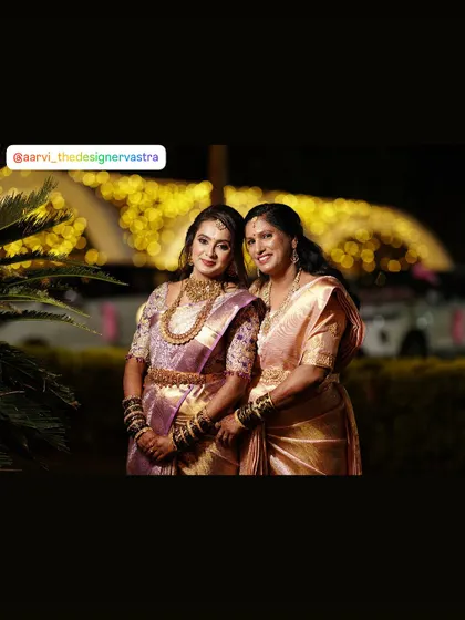 Mother and daughter twinning in beautiful lavender and pink sarees. It's always special to design for multiple generations of a family.