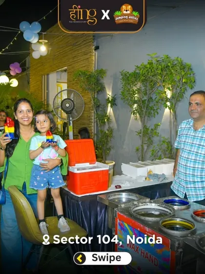 A mother and daughter proudly show off their colorful wax hand creation. It's a fun and creative souvenir from the party.