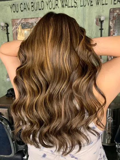 The result of a careful color correction. The hair is now a beautiful, multi-tonal brunette. (No filter)
