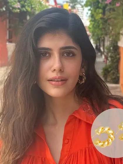 The lovely Sanjana Sanghi looking absolutely radiant in my Braided Beauty Hoops. These chunky, twisted gold hoops are the perfect accessory to make any outfit pop.