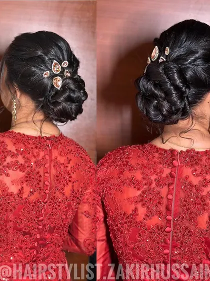 An elegant updo with a braided element, accented with sparkling teardrop-shaped clips. This is a sophisticated choice for a reception or evening event.