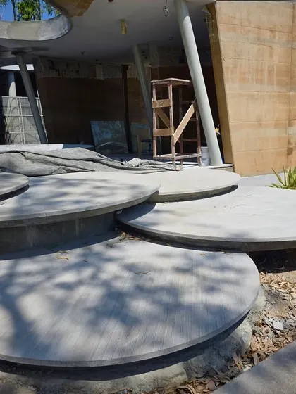 A closer view of the overlapping circular concrete platforms, which create a playful yet functional landscape feature at the resort.