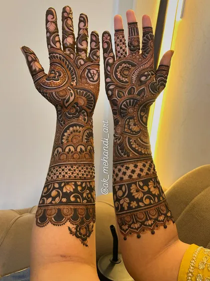 The reverse side of the same bridal design, showing how the patterns flow beautifully from the front to the back.
