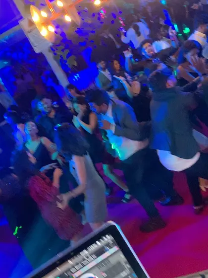 A blurry, action-filled shot of the dance floor. Pure energy.