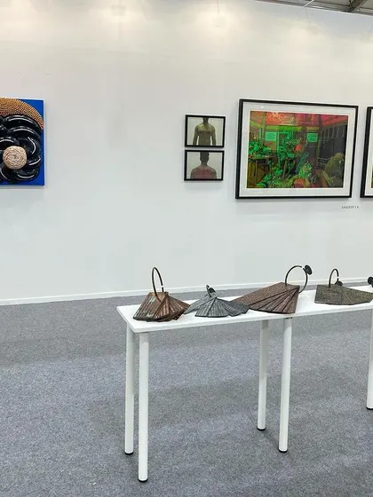 Another view of our Art Mumbai booth, showing the layout of sculptures and photographs.