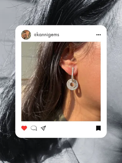 Some pieces do not just complete your look, they become a part of who you are. This image, styled like a social media post, features a stunning diamond pendant and solitaire ring.