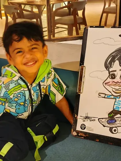 This young skateboarder looks so happy with his action-packed caricature. I love adding dynamic elements to my drawings.