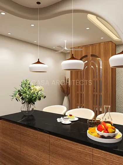 A render of a modern kitchen and dining area, featuring a stylish breakfast bar with pendant lights and an arched entryway leading to the dining space.