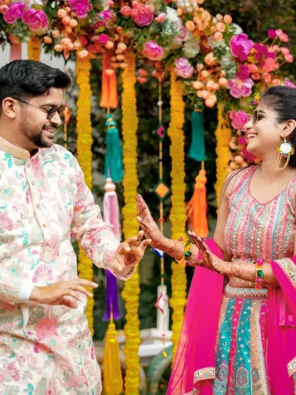 A candid dance moment, capturing the fun and festive mood of the Haldi celebration.