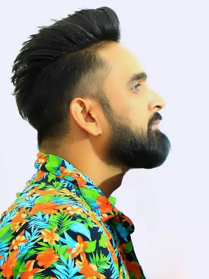 Rocking a vibrant floral shirt. My style is as eclectic and energetic as my music sets.