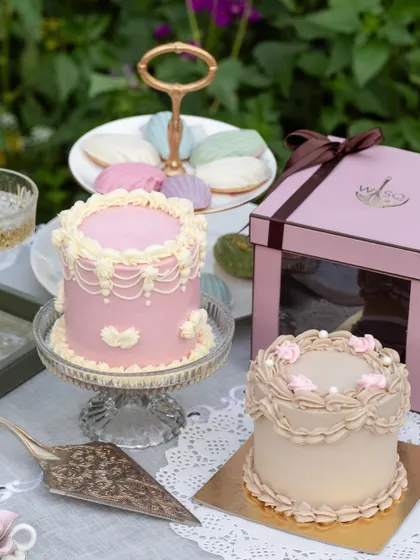 A duo of our vintage-style mini cakes, perfect for a Mother's Day celebration or a high-tea event. The intricate piping work showcases our dedication to detailed craftsmanship.