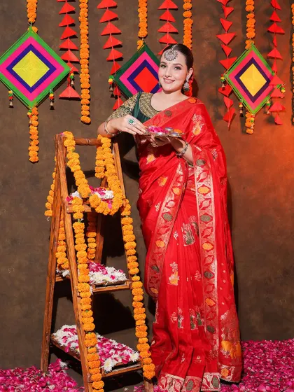 A full-length view of the red Banarasi saree, perfect for any traditional occasion.