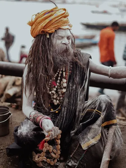 Portraits of Aghori sadhus at the ghats, their bodies covered in ash. These images document the lives of those who renounce worldly attachments in their pursuit of spiritual enlightenment.