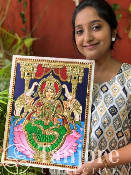 Our beloved student Gauthami with her custom Gaja Lakshmi painting. Seeing the happiness on a student's face is the most satisfying feeling.