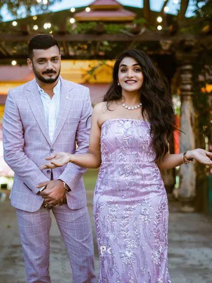 Another shot of the power couple, showcasing their impeccable style and our custom designs.