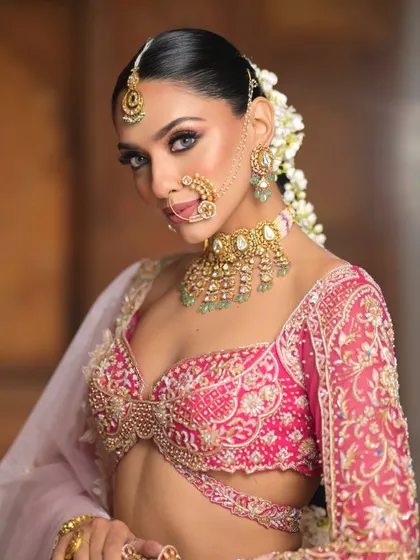 A final close-up of this fairytale bride. The sharp eye makeup and glowing skin create a look that is both powerful and delicately beautiful.