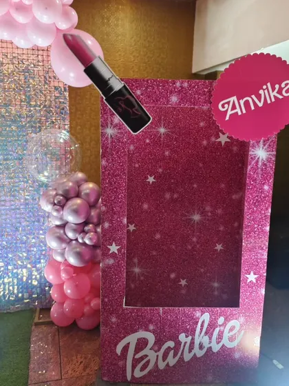 A fun, life-sized Barbie box photo prop for guests.