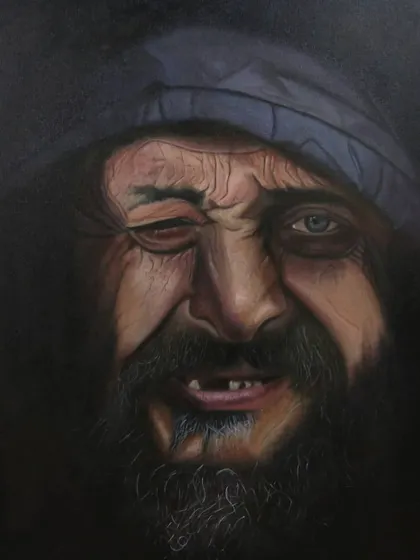 A close-up of the nearly finished piece. The texture of the skin, the beard, and the emotion in the eyes are all coming together through careful, patient brushwork.