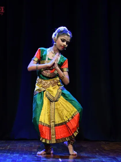 A student from our junior Bharatanatyam batch, poised and ready. It's amazing to watch their confidence grow with each performance.